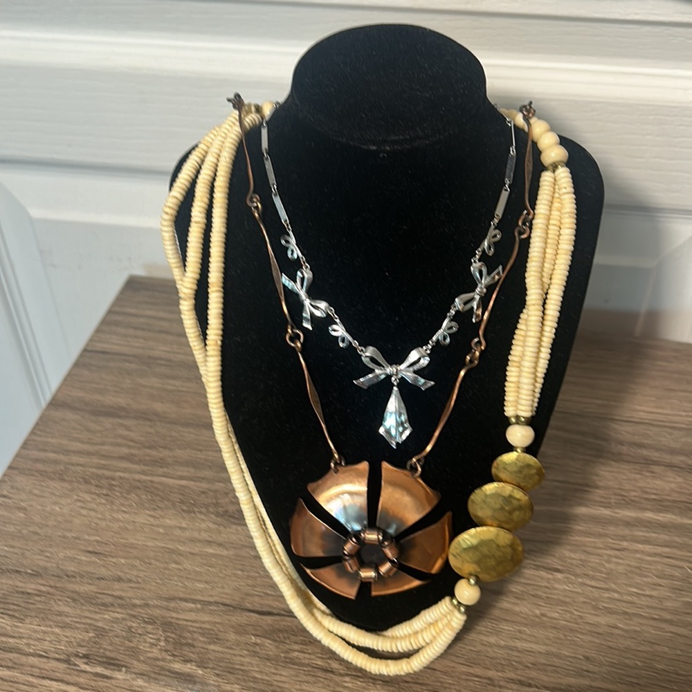 LOT OF THREE NECKLACES COPPER BEEDS AND STEEL tones